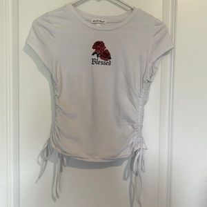 Women’s top with flower graphic